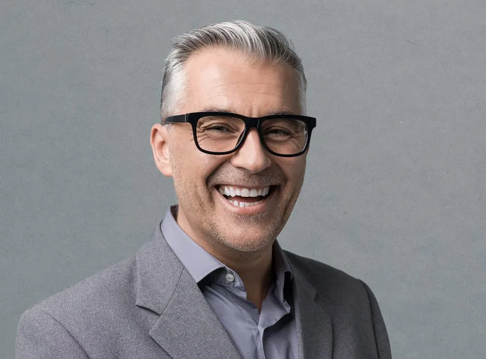grey hairstyle for men over 50 with glasses.jpg